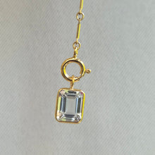 Load image into Gallery viewer, Gold chain with a diamond-like crystal on a light gray background
